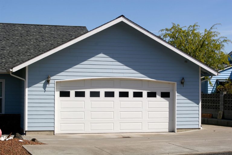 Residential garage doors installed on a home in River Ridge.