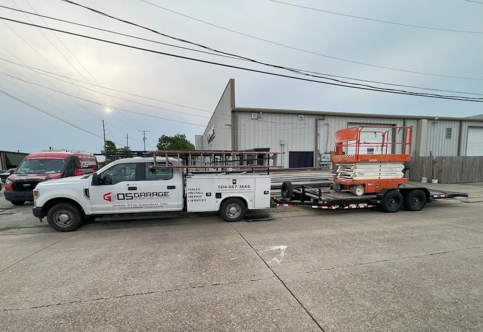 After-hours emergency overhead door service truck at site