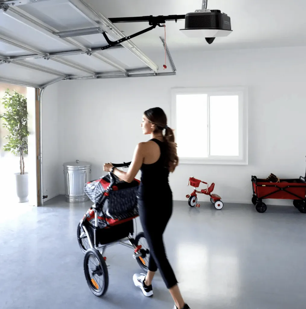 Homeowner using a quiet belt-drive garage door opener in New Orleans