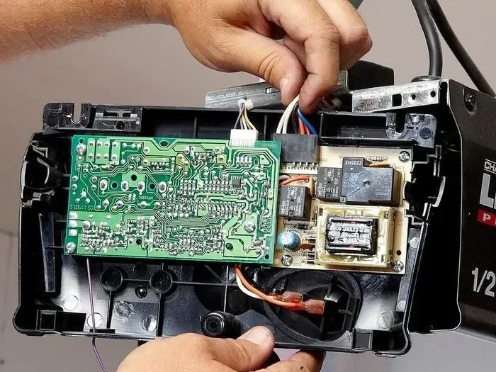Garage door opener logic board repair and replacement