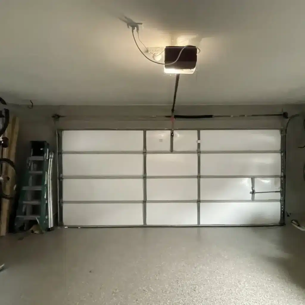 Interior view of garage before new door installation — New Orleans home
